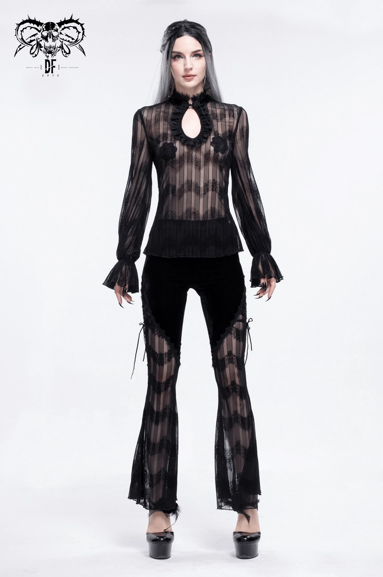 Black gothic flared trousers on model demonstrating movement and drape of mesh panels