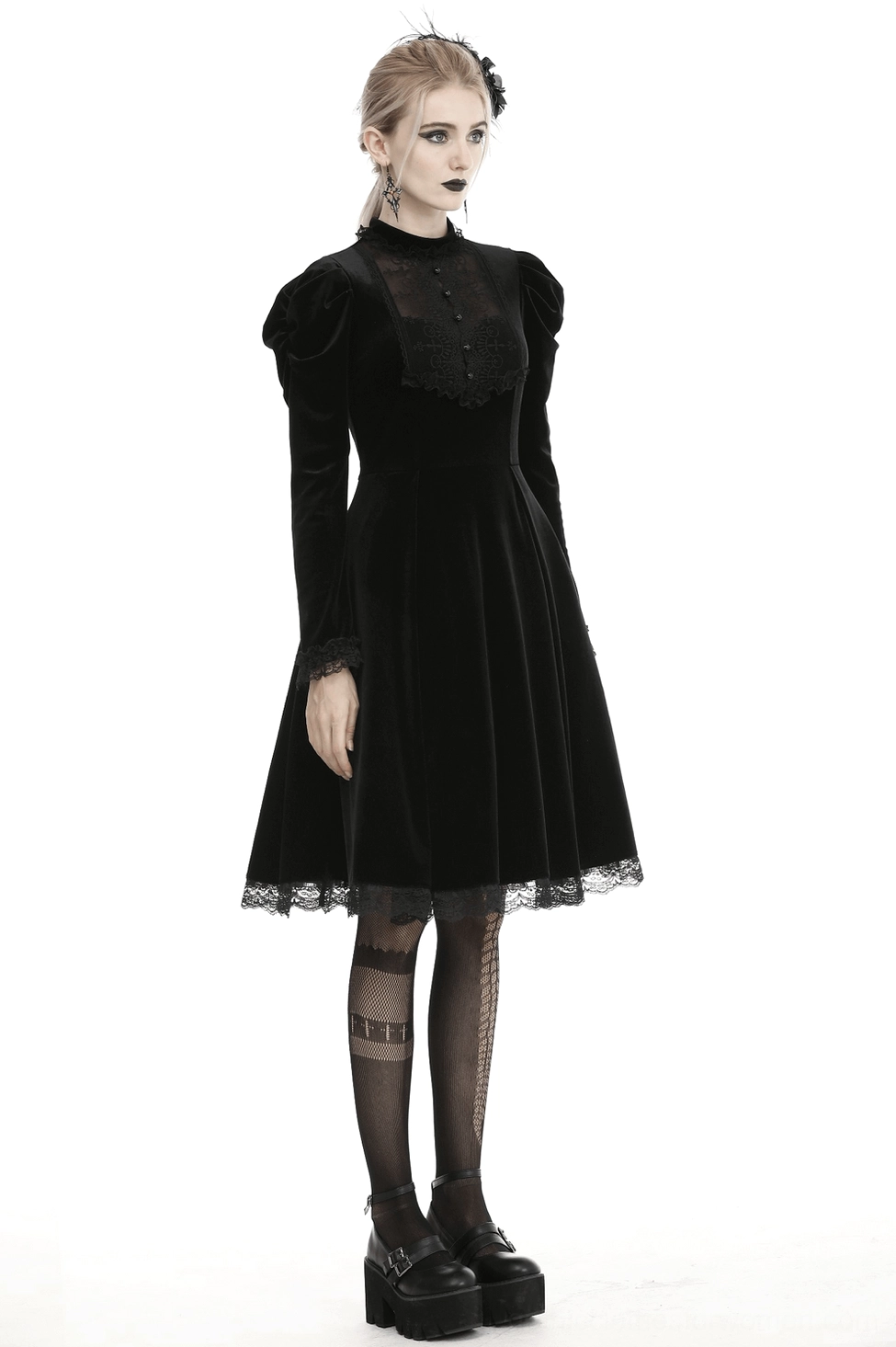 Full-length back view of black gothic velvet dress showing zipper closure and elegant drape