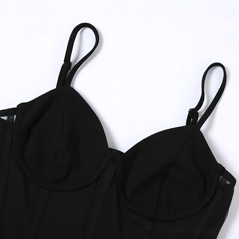 Close-up detail of black gothic dress bust area showing underwire bra cups and spaghetti strap construction