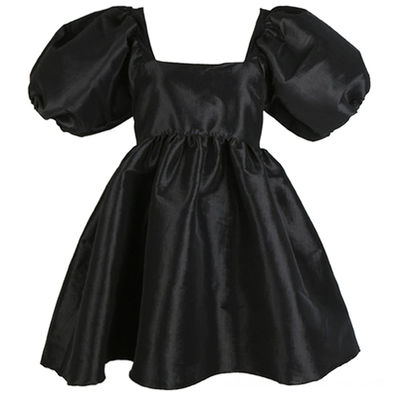 Flat lay of black gothic puff sleeve mini dress showing gathered waist and solid fabric construction