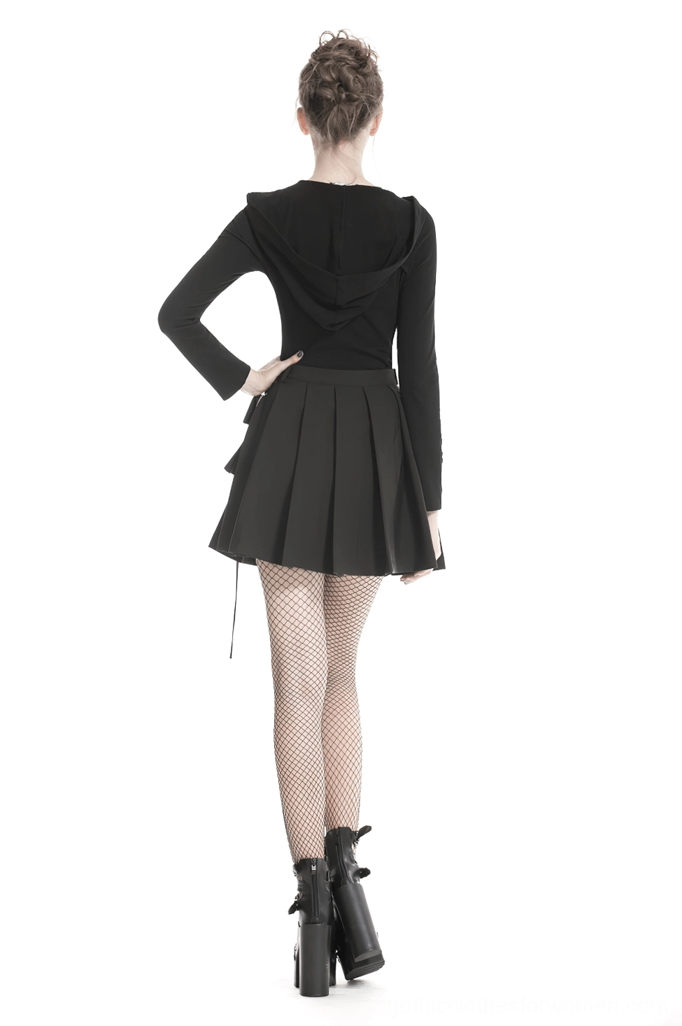 Black pleated gothic mini skirt showing front zipper opening and structured waist construction