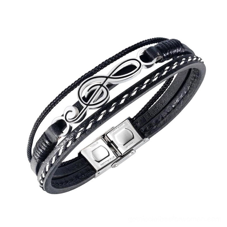 Large treble clef gothic multilayer leather bracelet with contrast stitching, side overhead view