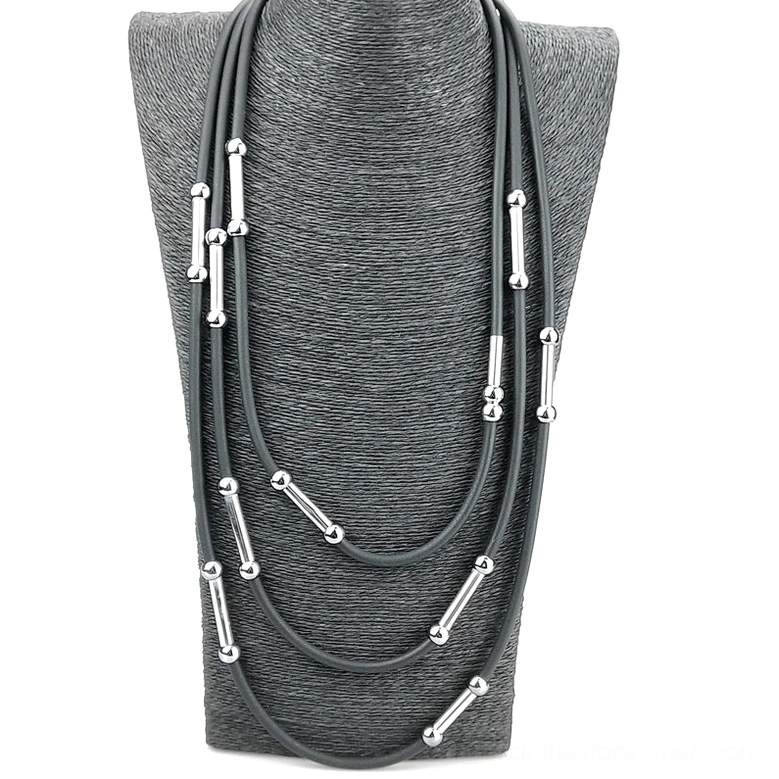 Multi-layer gray gothic necklace on jewelry display bust with silver metal accents