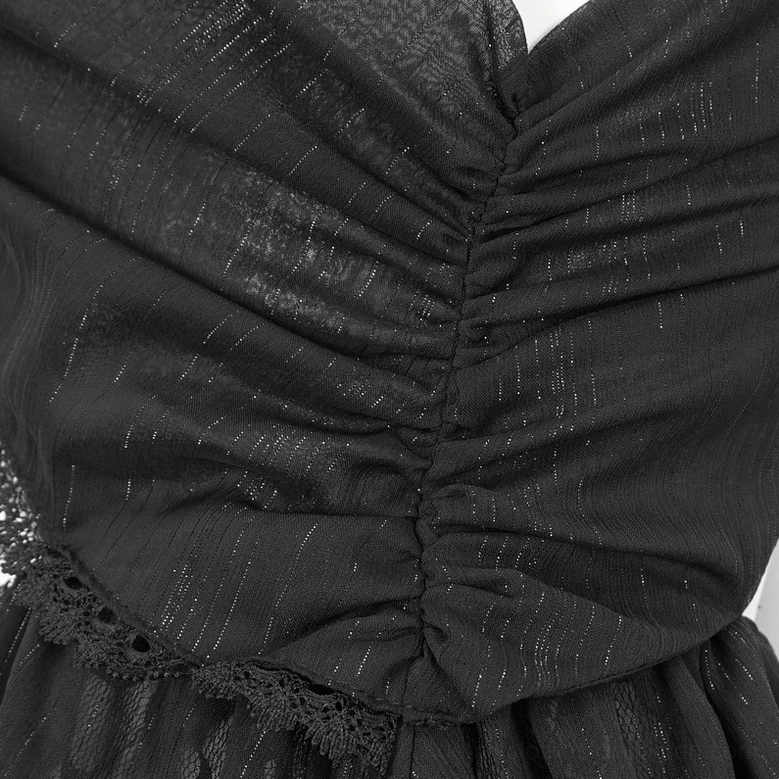 Black gothic nightdress chain hardware and lace edge detail, close-up macro photography