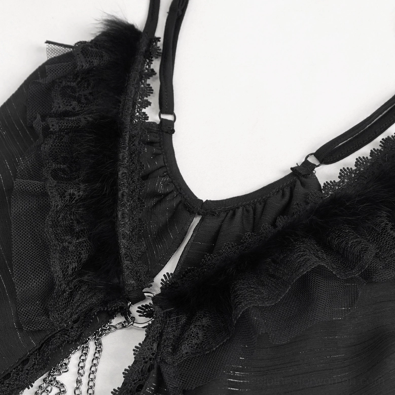 Black furry ruffle trim and chain hardware on gothic lace nightdress, close-up detail shot