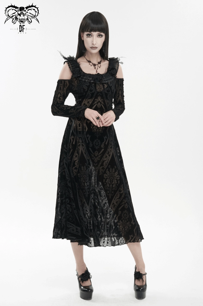 Model in black gothic off-shoulder dress front pose with hands clasped, highlighting damask pattern and fabric texture