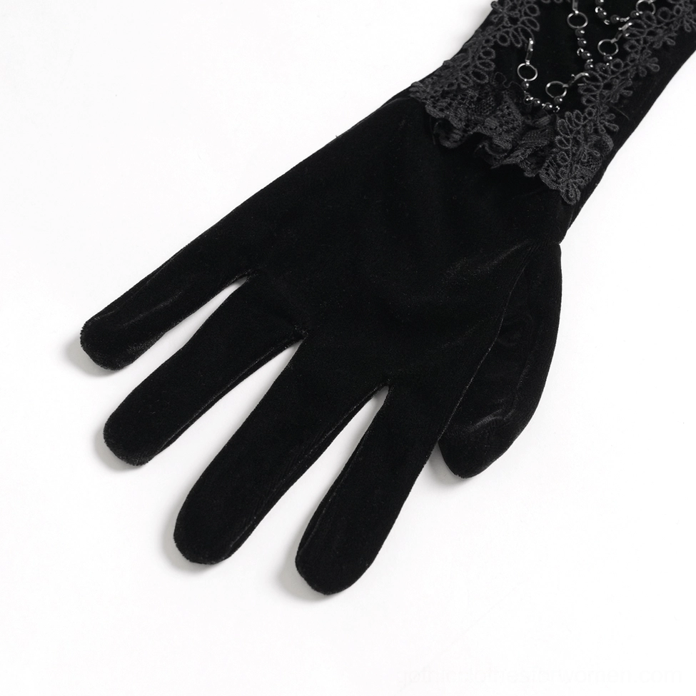 Detailed view of black velvet gothic opera gloves highlighting the metal chain spiral embellishments, lace ruffles, and premium fabric construction