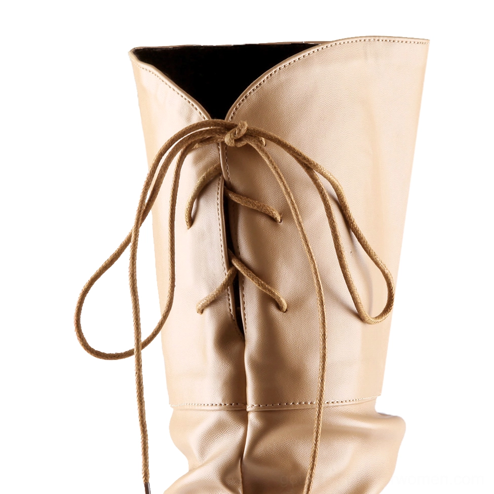 Gothic over-the-knee boot construction detail showing ruched shaft, lace-up back closure, and block heel