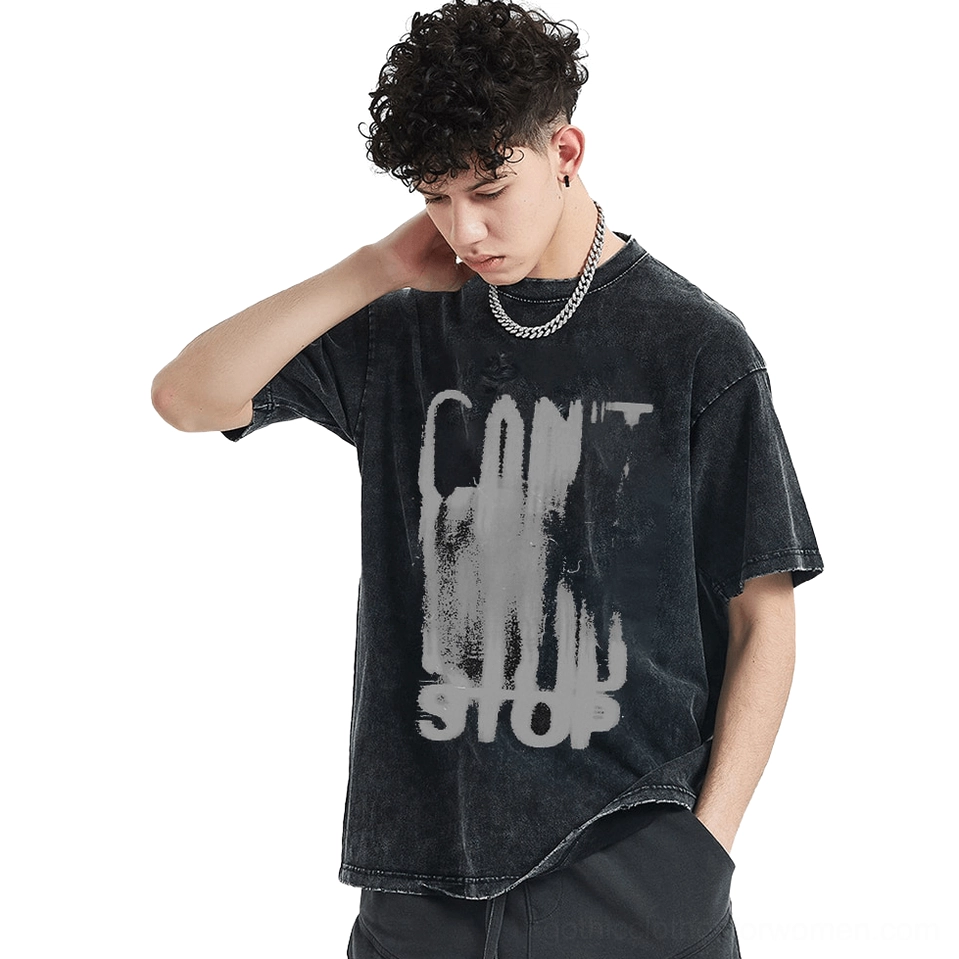 Male model wearing oversized black cotton gothic graphic tee with faded CAN'T STOP print, three-quarter side view showing relaxed unisex fit and distressed vintage aesthetic