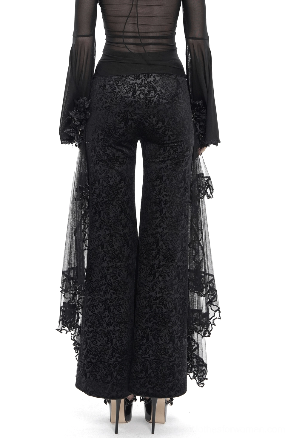Black gothic palazzo trousers rear view showing sheer mesh train and flocked velvet texture detail