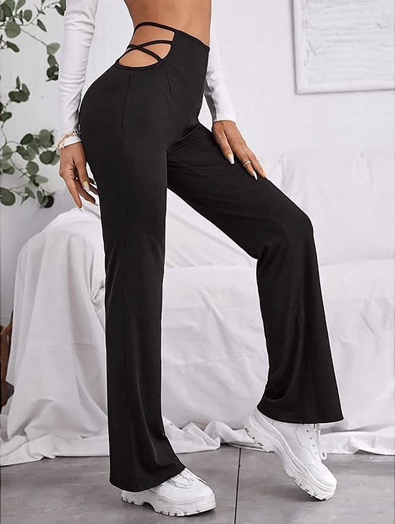 Detailed shot of gothic pants architectural hollow-out strap construction and design elements