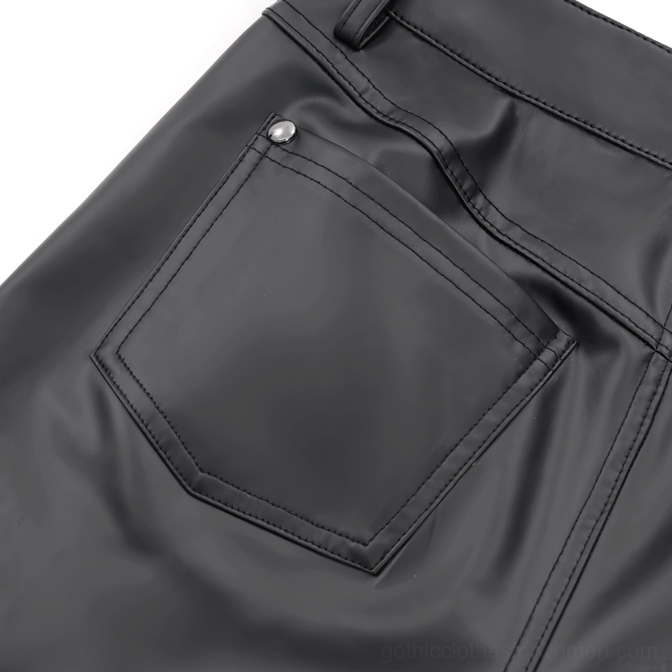 Close-up detail of gothic pants back pocket with stitching and metal rivet on synthetic leather