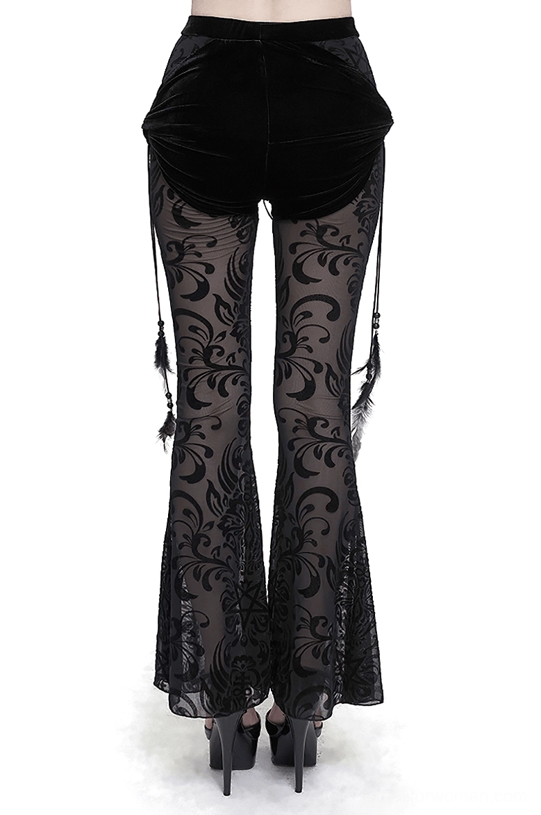 Back view of gothic mesh flare pants highlighting velvet back waist and hanging feather tassel ornaments