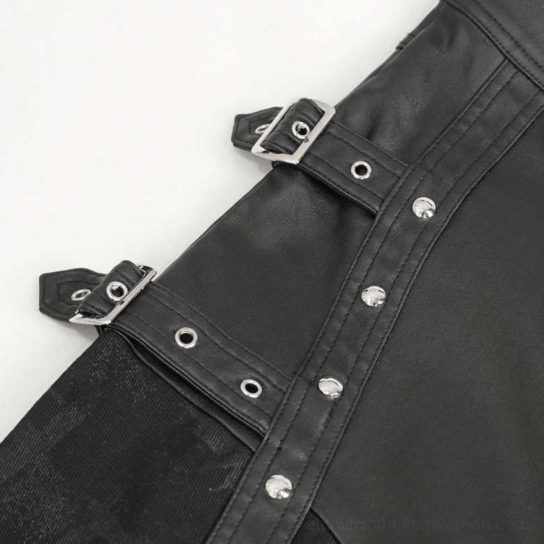 Black gothic pants buckle strap close-up macro view, metal buckles and rivet decorations on faux leather