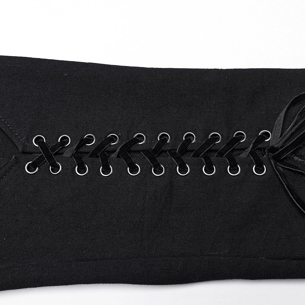 Close-up detail of metal eyelets and ribbon drawstring lace closure on black gothic pants