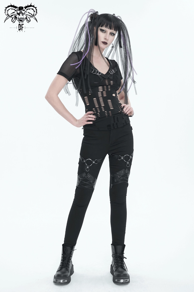 Front detail view of black gothic slim-fit pants with focus on O-ring placements and design elements