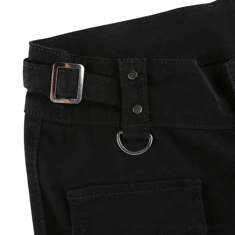 Black gothic cargo pants detail shot emphasizing metal zipper mechanisms and industrial design elements
