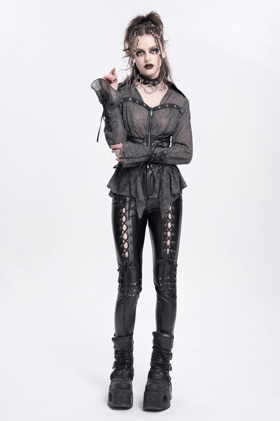 Black gothic lace-up pants model rear view with emphasis on back pockets and knee lacing details