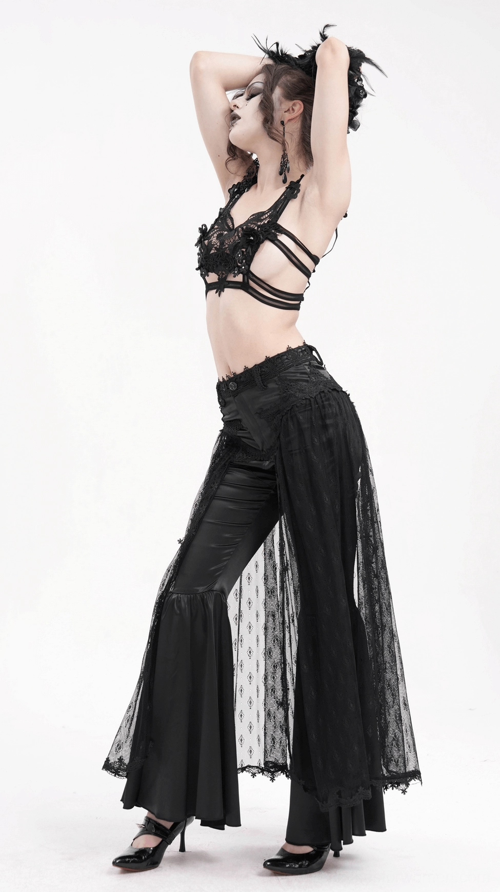 Black gothic lace pants detail shot highlighting satin body and delicate lace mesh paneling