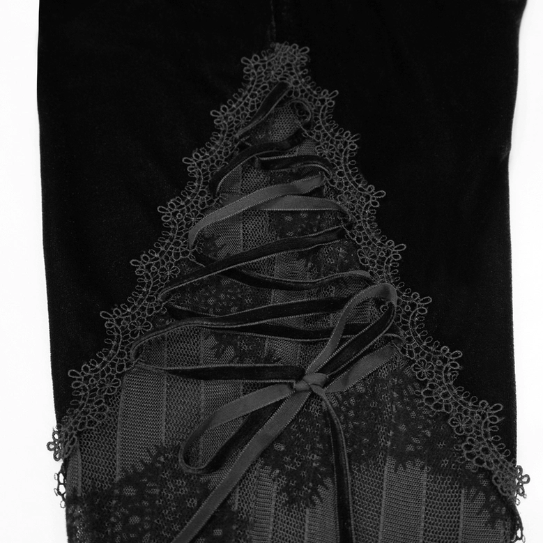 Side close-up of ribbon lace-up detail with lace trim on black velvet gothic pants