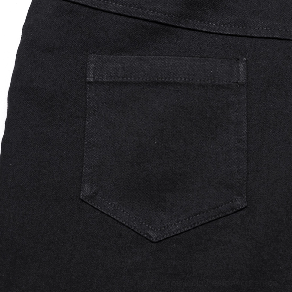 Close-up detail of V-shaped black denim pocket on gothic lace flared pants