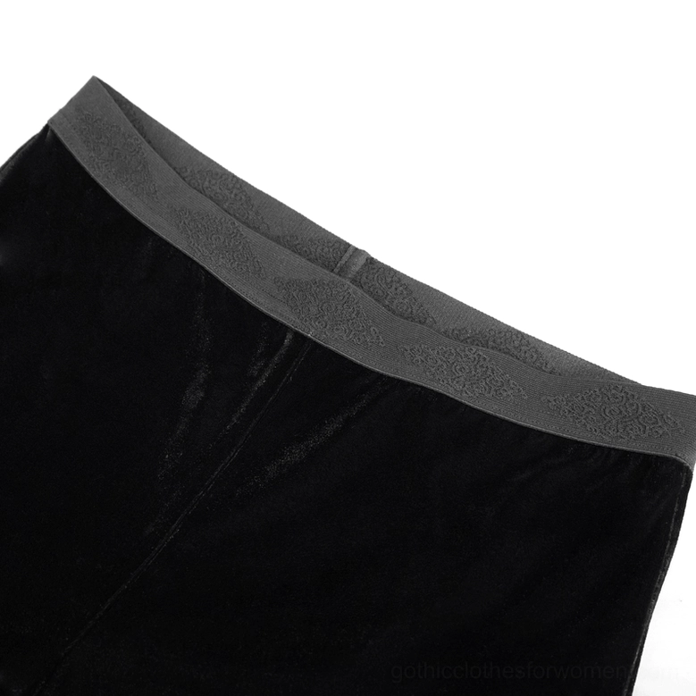 Close-up of gothic pants waistband showing black velvet elastic waist and neat trim edge