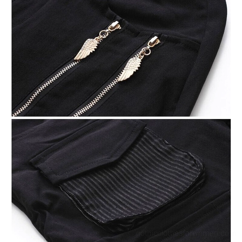 Close-up detail of wing-shaped metal zipper pulls and dual zippers on black gothic cargo pants