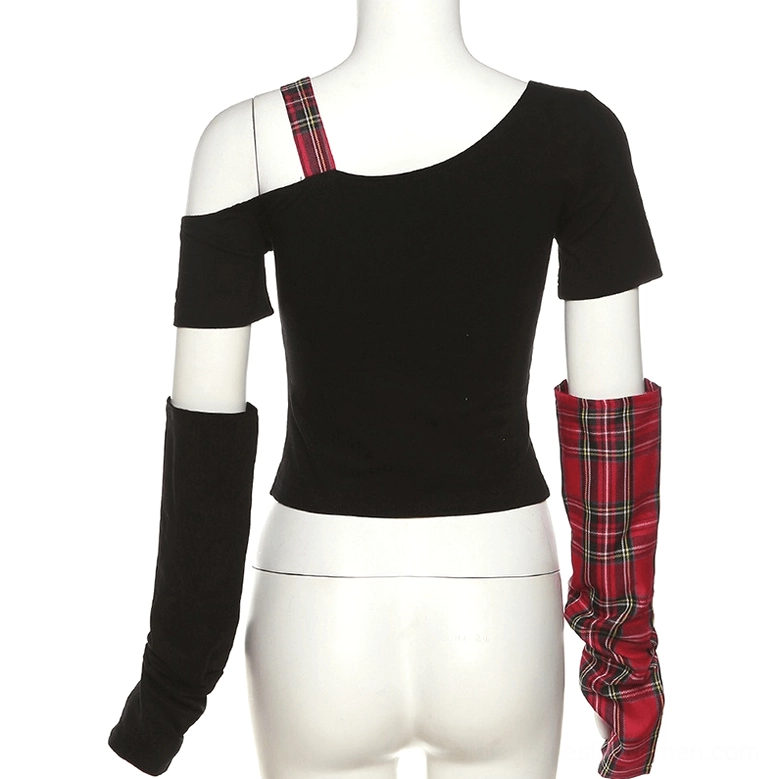 Back view of gothic patchwork crop top on mannequin, displaying asymmetrical plaid shoulder strap and solid black knit fabric construction