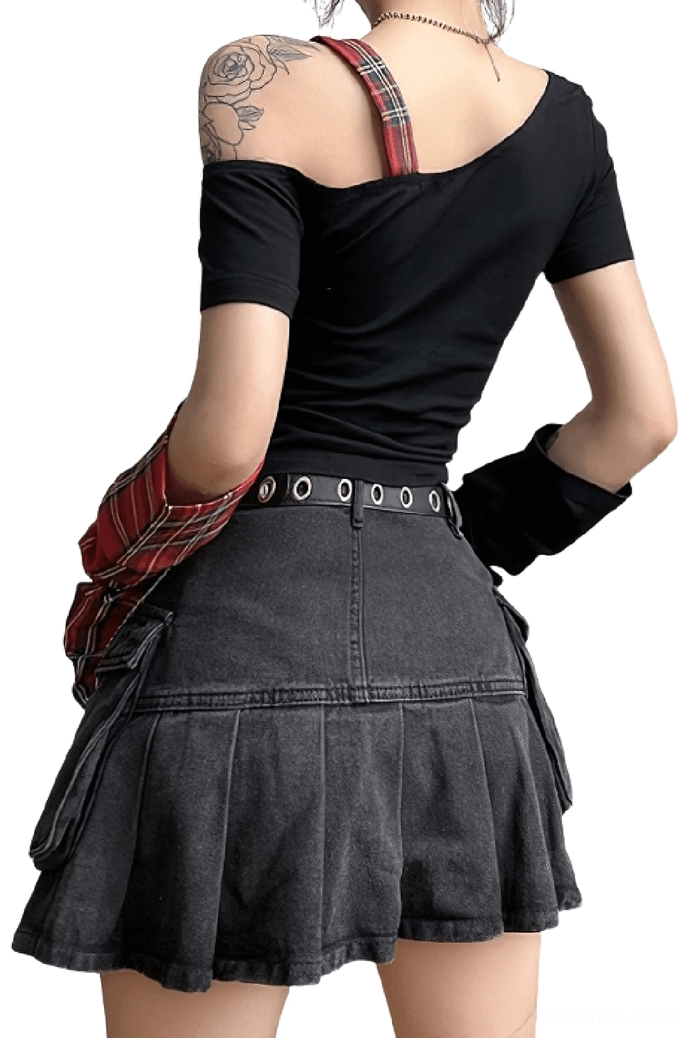 Back view of gothic one-shoulder patchwork crop top with adjustable plaid shoulder strap and metal buckle details, styled with pleated denim skirt