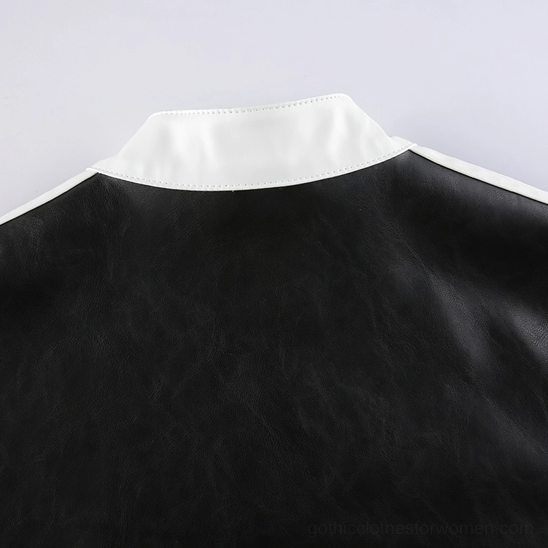 Alternative styling detail of black and white gothic patchwork jacket on mannequin with focus on construction quality