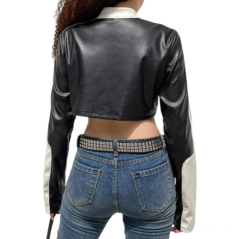 Rear view of patchwork gothic jacket showing solid black back and white sleeve patches on cropped silhouette