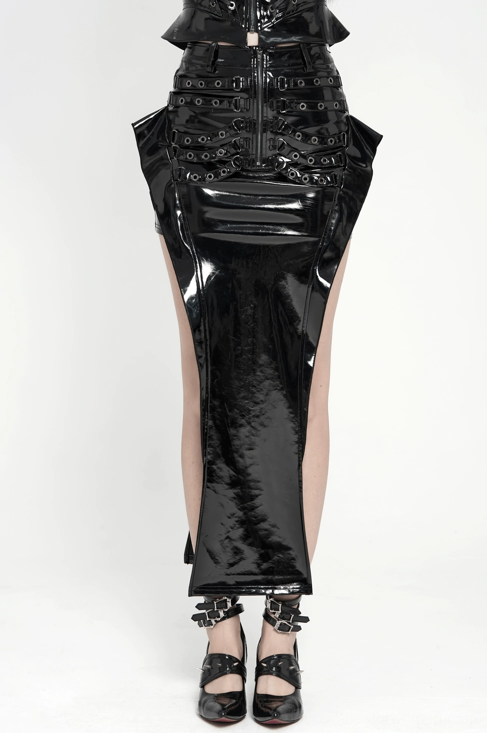 Back detail of black patent leather gothic maxi skirt showing fishtail hem design and back panel structure