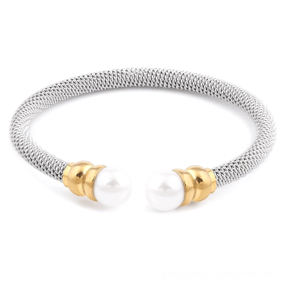 Open cuff victorian pearl gothic bracelet with silver and gold metalwork, front view displaying perfectly round white pearls