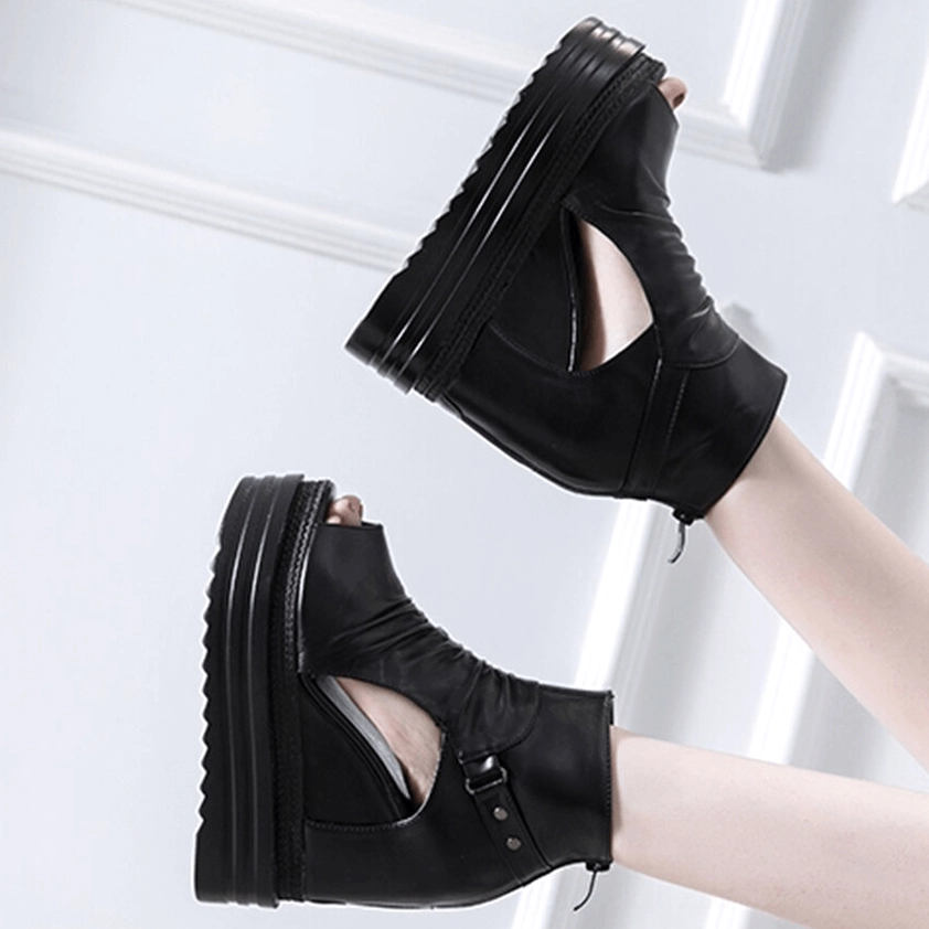 Gothic peep toe wedge ankle boots on model showing hidden rear zipper and side cutouts