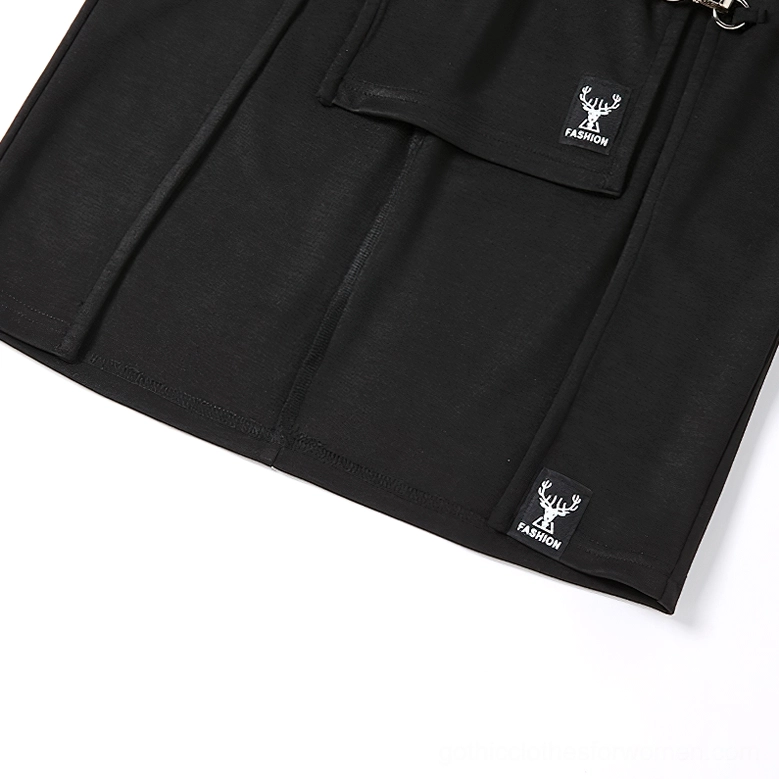 Flat lay detail of black gothic pencil skirt displaying metal ring embellishments and waistband