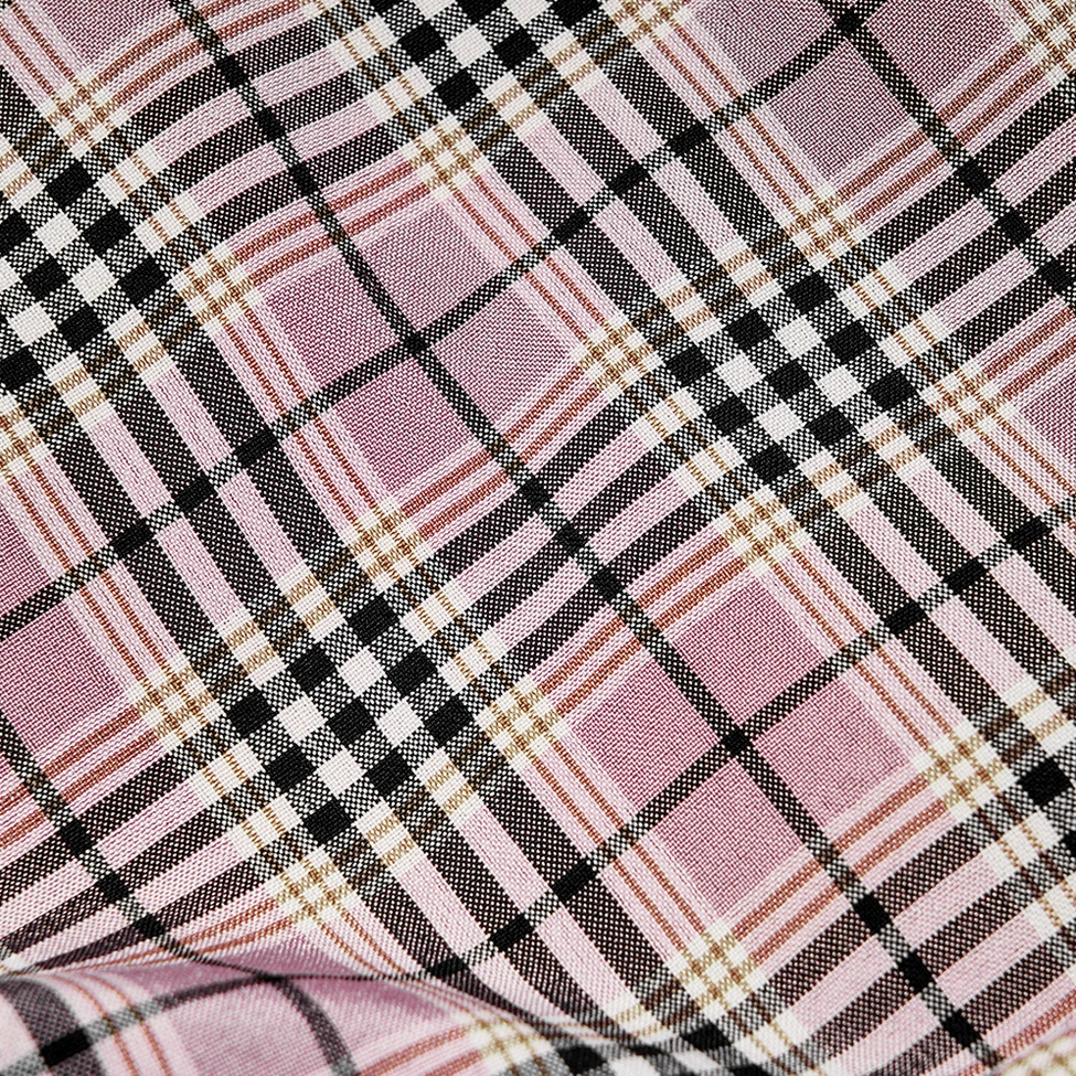 Black pink plaid gothic mini skirt texture and construction detail of woven fabric and mesh materials