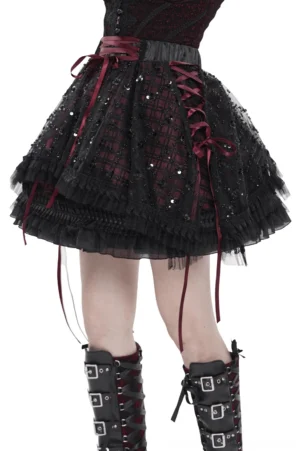 Black wine red gothic plaid tulle skirt rear view displaying side ribbon lacing and asymmetrical hem with dangling straps