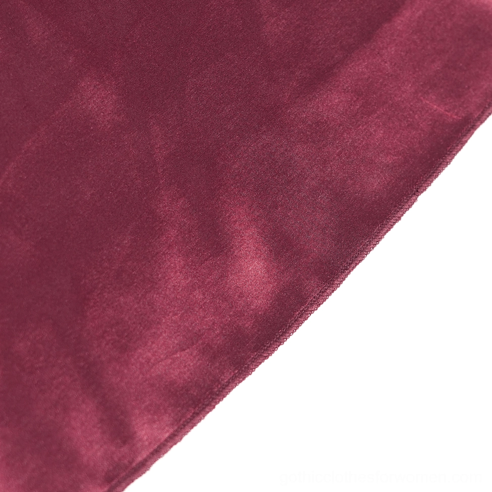 Gothic plaid tulle corset-inspired skirt detail view showcasing wine red ribbon construction and tied lacing design