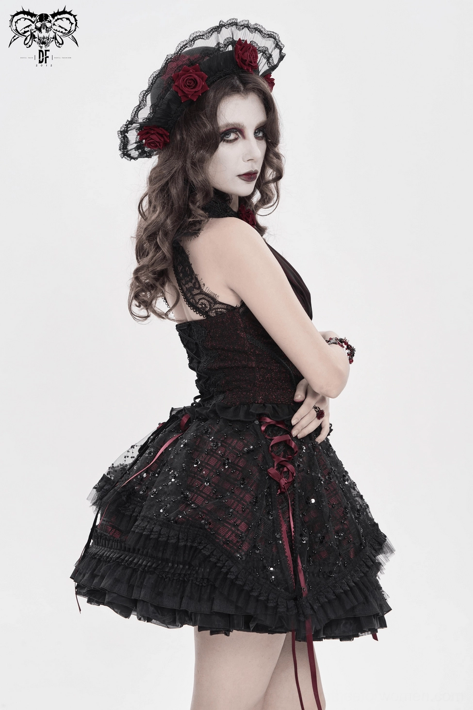 Gothic plaid tulle corset-style skirt highlighting burgundy ribbon structure and feminine gothic silhouette