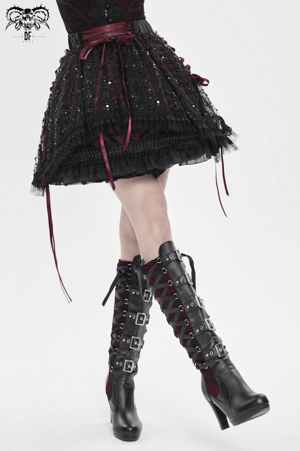 Black wine red gothic plaid tulle skirt highlighting elegant drape and structured fit with ribbon waist detail