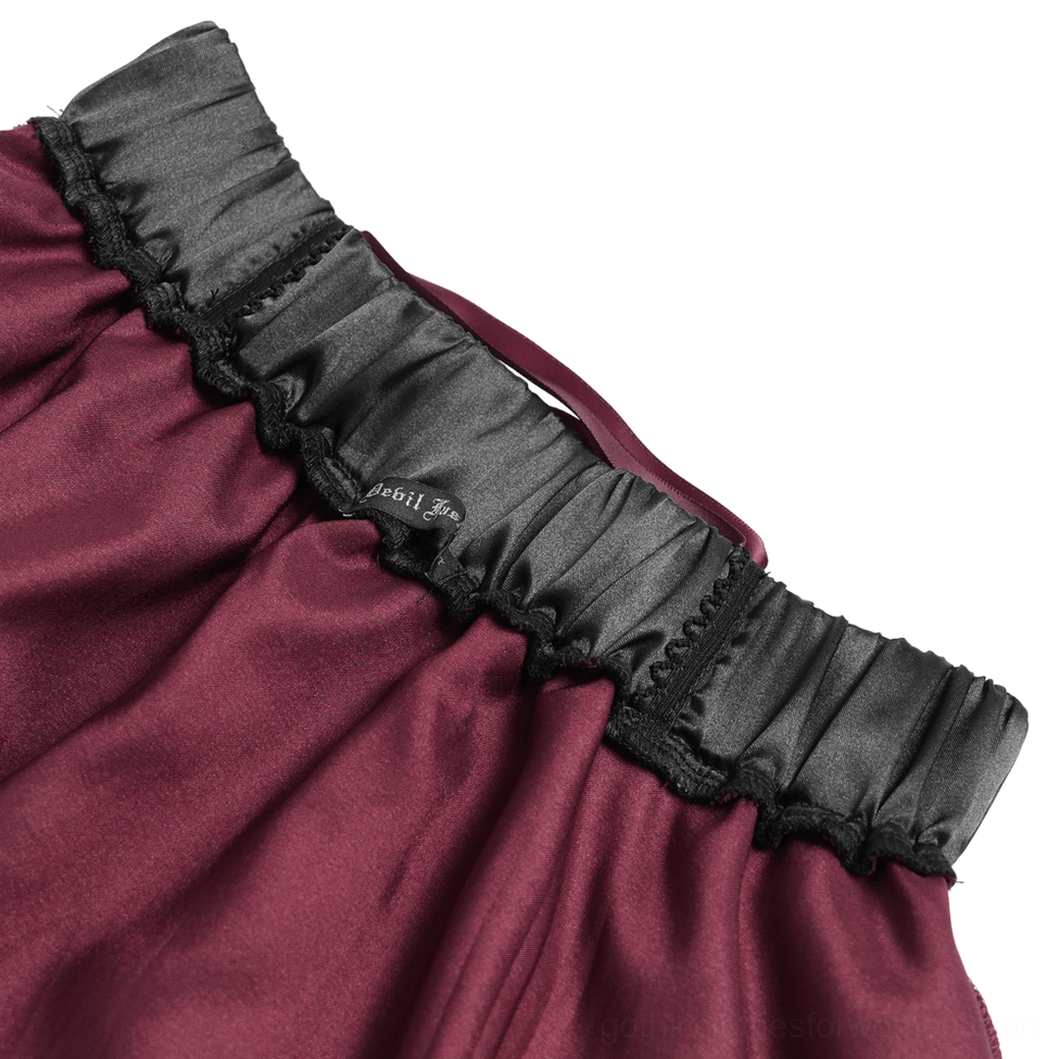 Gothic plaid tulle skirt showing full layered silhouette with sequin mesh overlay and asymmetrical ruffled hem