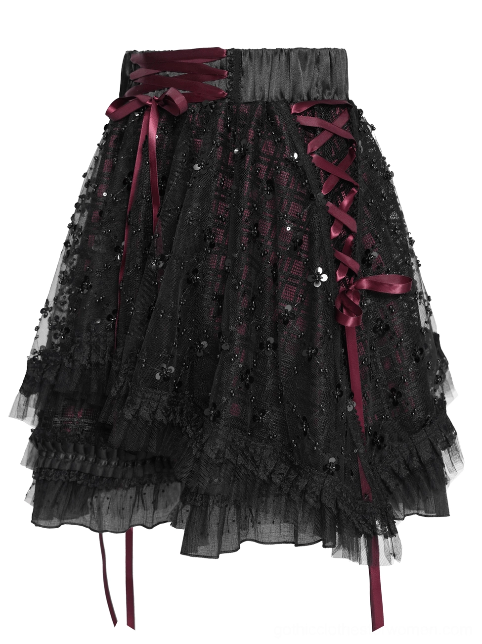 Gothic plaid tulle layered skirt flat lay showing sequin embellishments, plaid lining, and structured waist ties detail