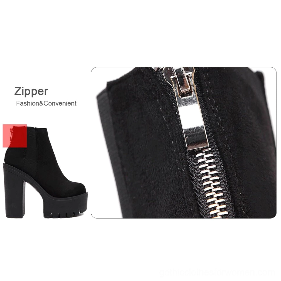 Black gothic platform ankle boots studio view showing complete boot silhouette with round toe and architectural platform presence