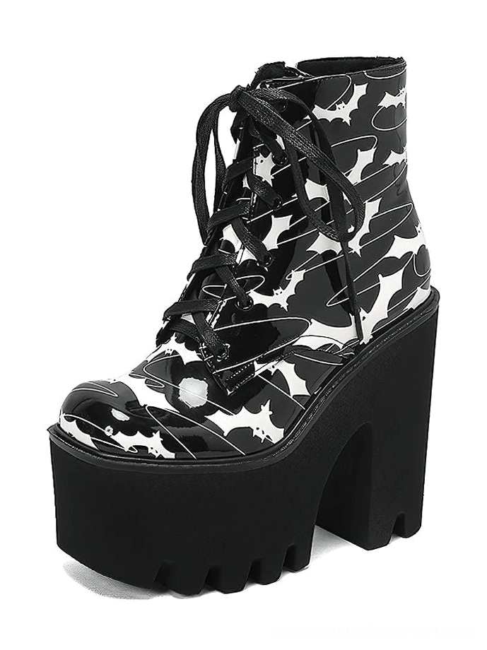 Black bat print gothic platform ankle boots with chunky square heel, left side profile showcasing lace-up front and bat wing pattern detail