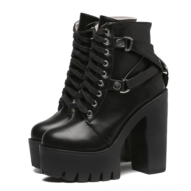 Black gothic lace-up platform ankle boots with decorative buckle straps front 3/4 view - chunky block heel and square platform silhouette