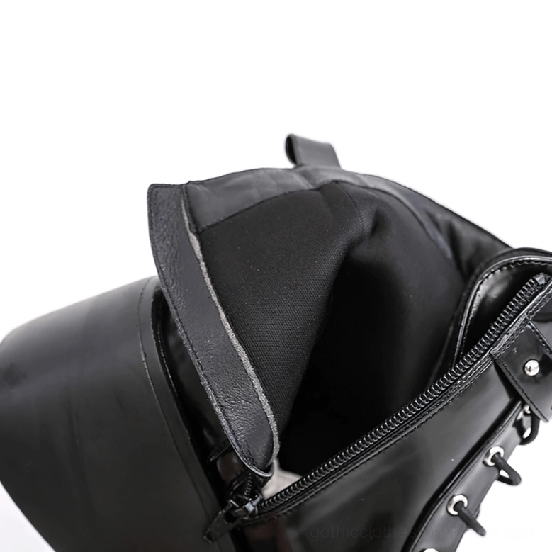 Gothic platform ankle boots showcasing buckle and rivet decorations with lustrous patent leather finish