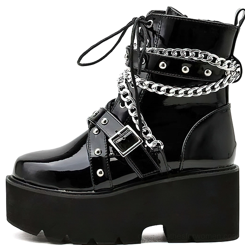Gothic black platform boots with decorative chain, silver rivets, and thick rubber platform sole for alternative style