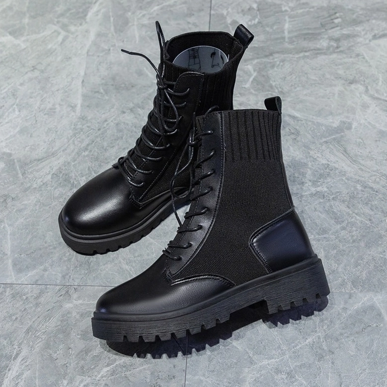 Black platform combat boots for women - gothic lace-up ankle boots architectural heel design detail