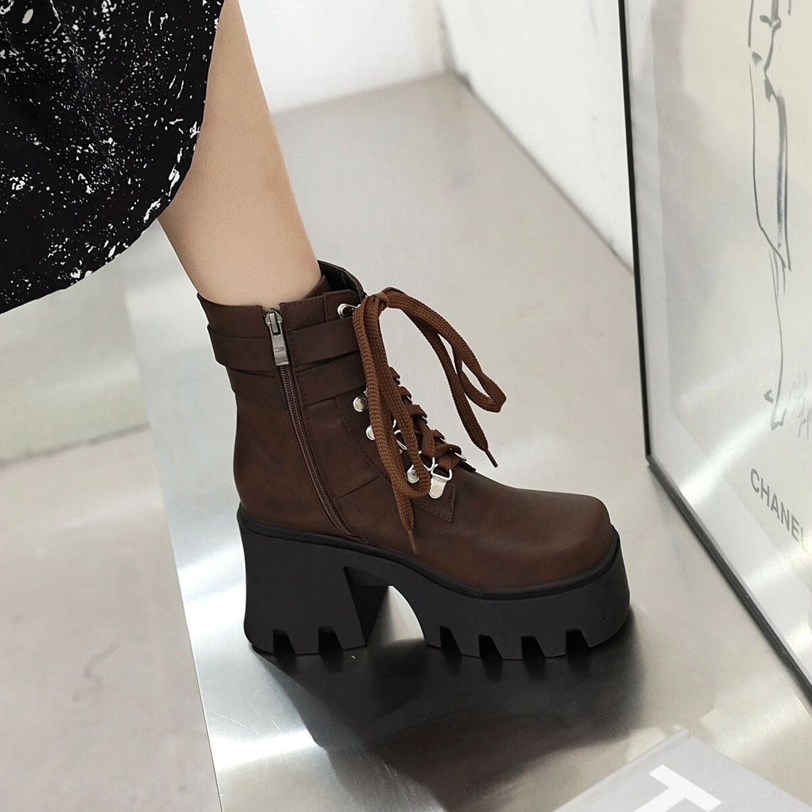 Multiple color options of gothic lace-up platform boots including black, brown, and yellow variants showcasing design versatility