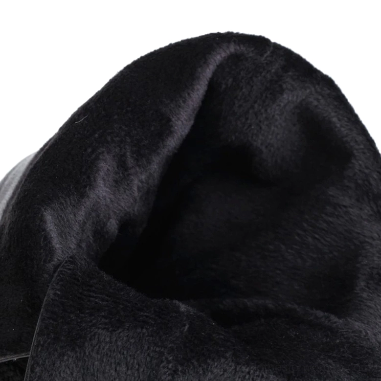 Soft plush warm lining inside gothic black platform boots close-up
